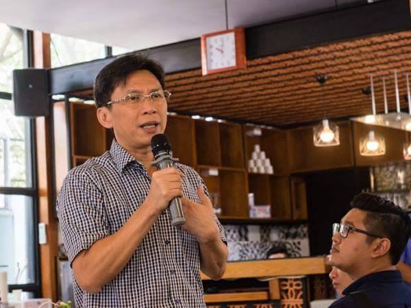 Ông Nguyễn Việt Dũng, Giám đốc Sở KH&CN TP.HCM giải đáp những thắc mắc của đại diện các doanh nghiệp tại Hội thảo. Ảnh: Thế An.