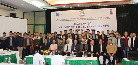 Photographof trainees with the organizers and trainers in Hanoi training course.